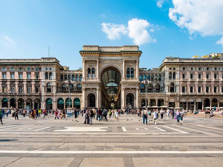 Duomo square and Galleria Vittorio Emanuele II shopping arcade, one of the most popular landmarks and shopping areas of Milan, Italy, with tourists