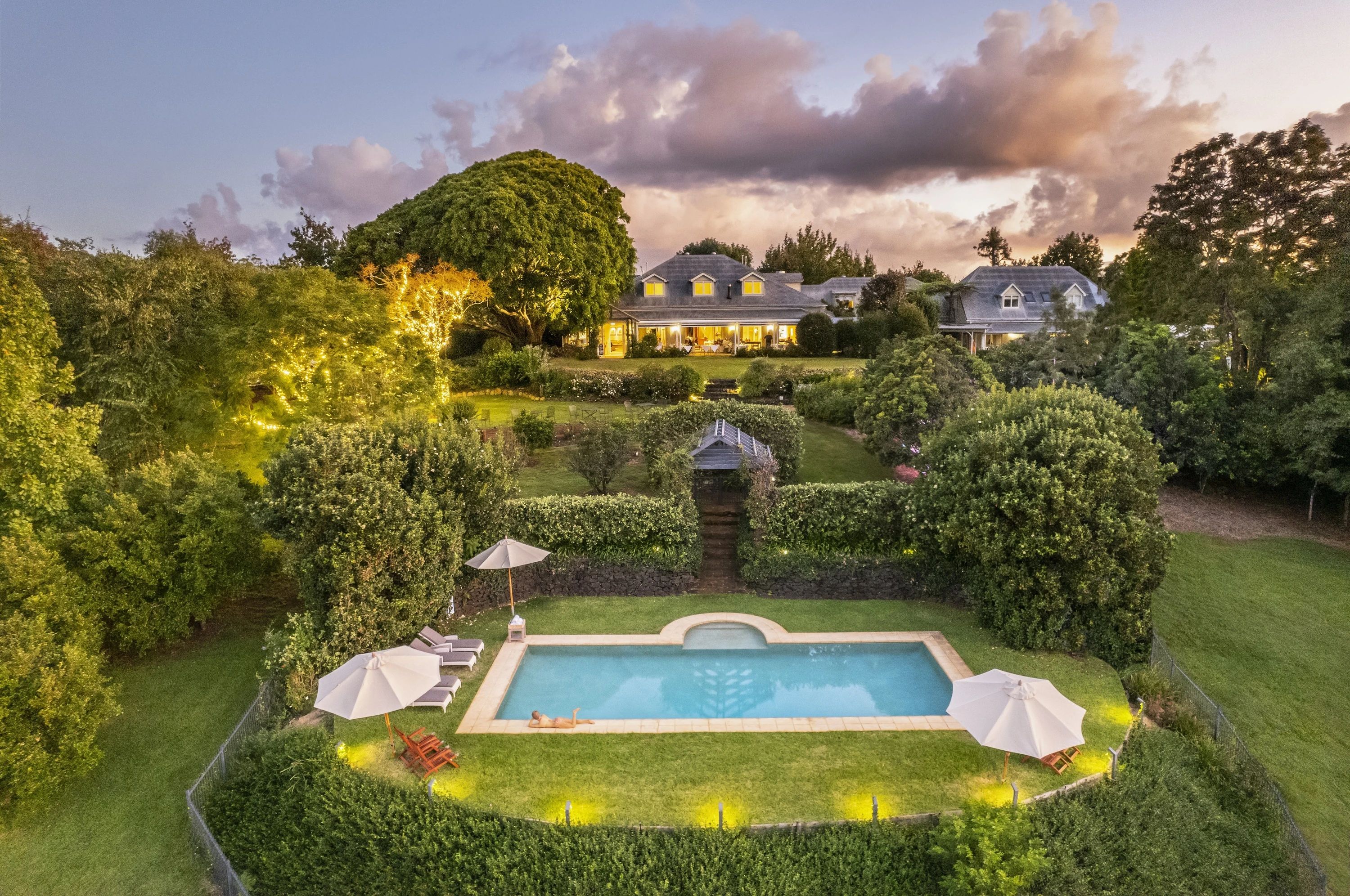 Estate with large house, pool and manicured gardens