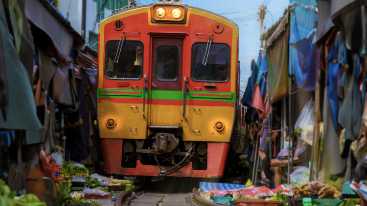 Make tracks for Maeklong Railway Market (Talad Rom Hub)