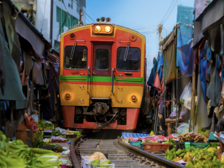 Make tracks for Maeklong Railway Market (Talad Rom Hub)