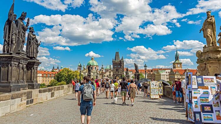 View of Old Town Bridge Tower, Baroque 17th Century Statues of Saints, Artists, and Tourists on Charles Bridge