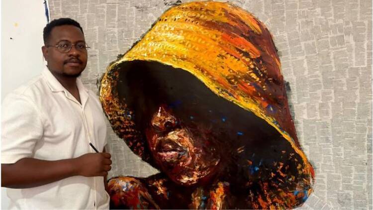 Thabiso Dakamela standing next to his painting
