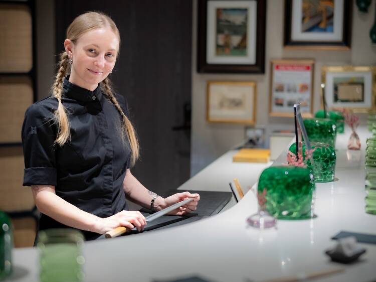 Two female sushi chefs on leading counters within the male-dominated industry