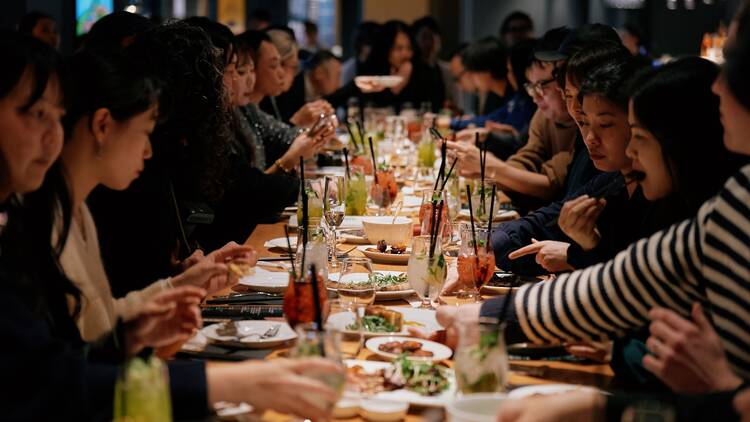 People dining at newly-opened Time Out Market Osaka