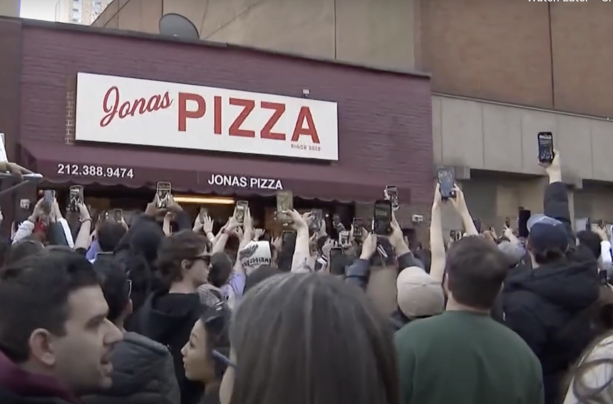 See videos of the Jonas Brothers serving slices at Joe's Pizza in NYC this weekend