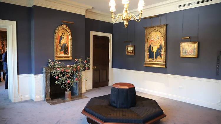 The Frick Collection The Gold-Grounds Room (blue painted walls with ornate paintings)