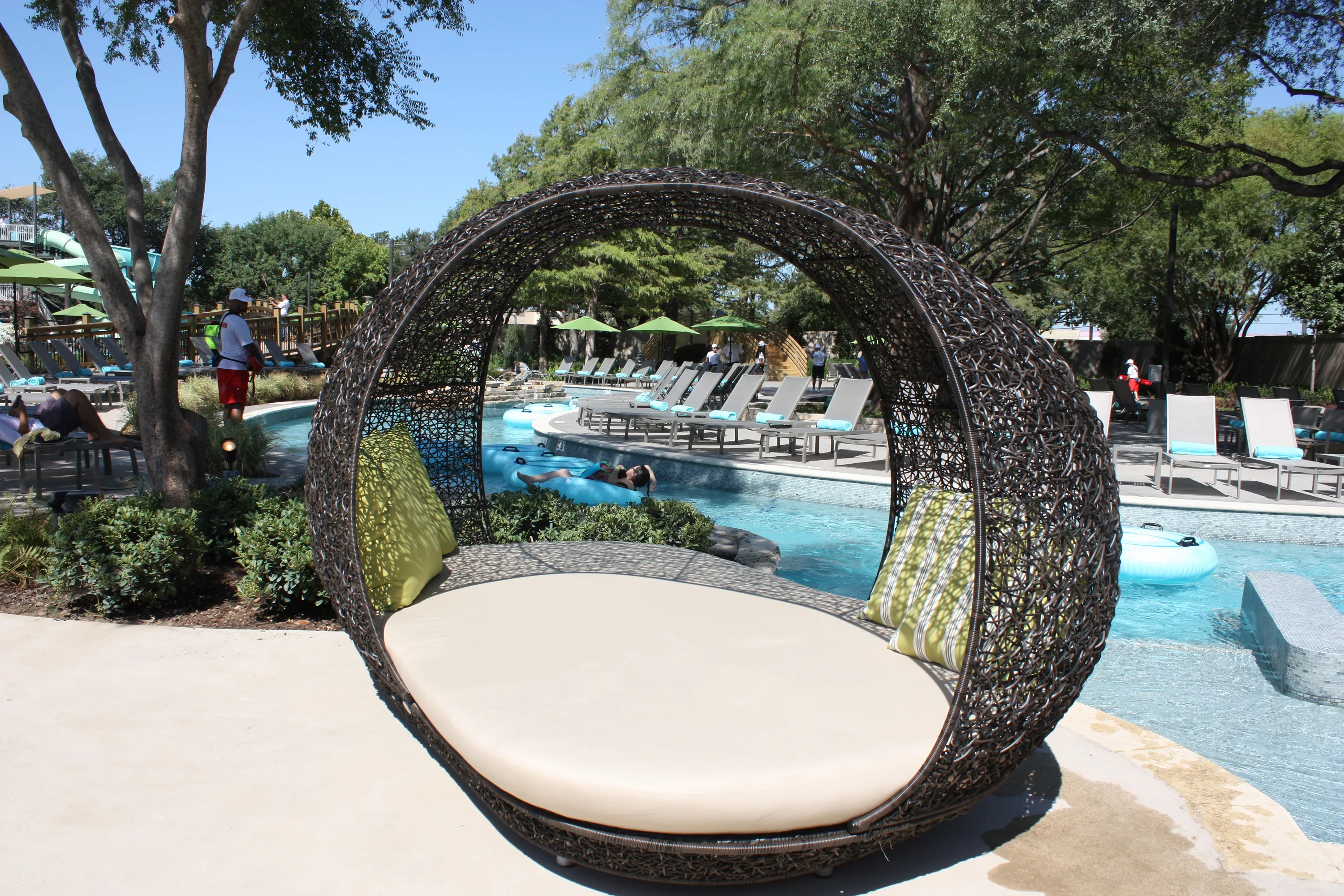 Hilton anatole wicker swing by pool