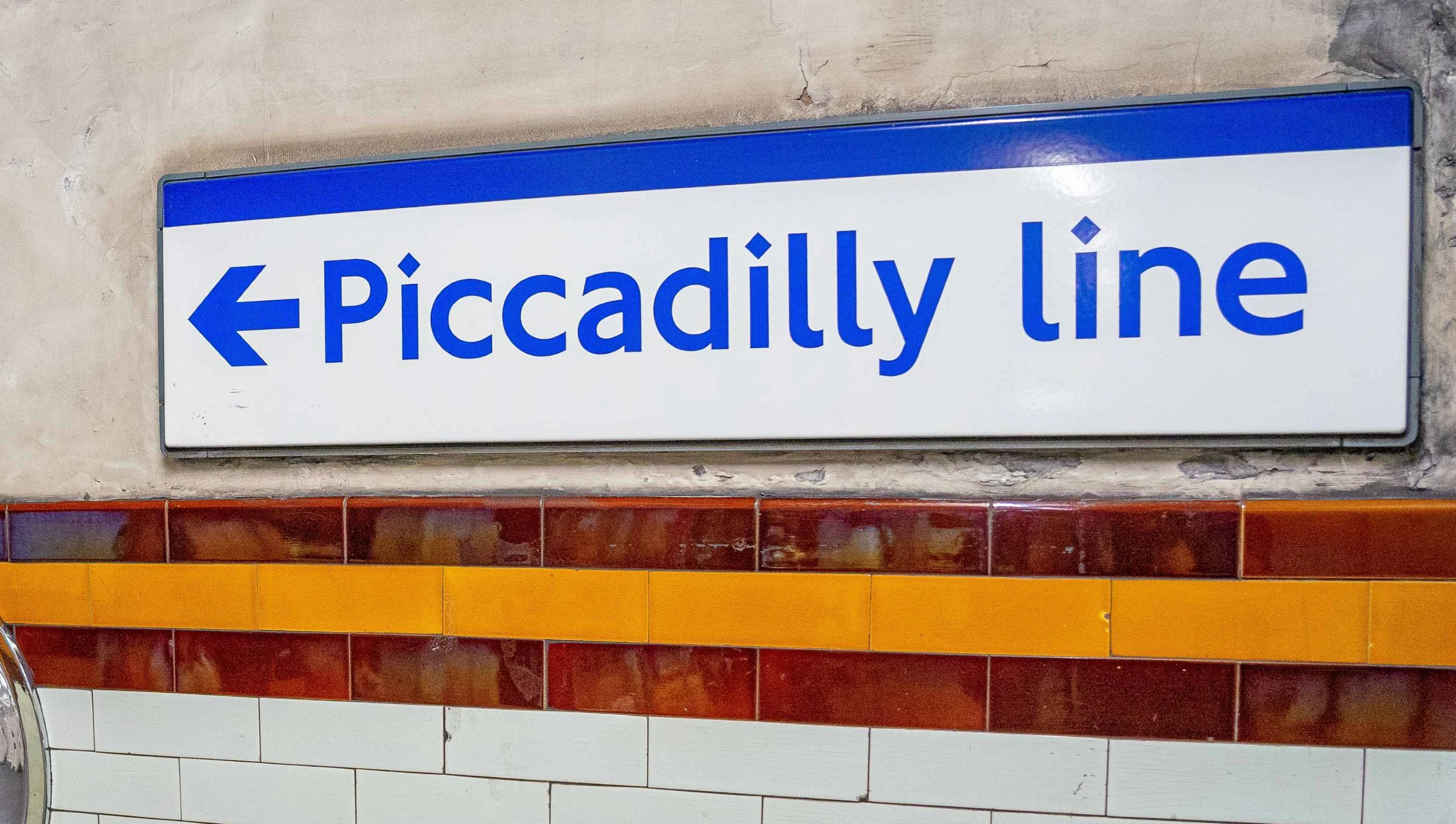 Piccadilly line sign in London on the tube