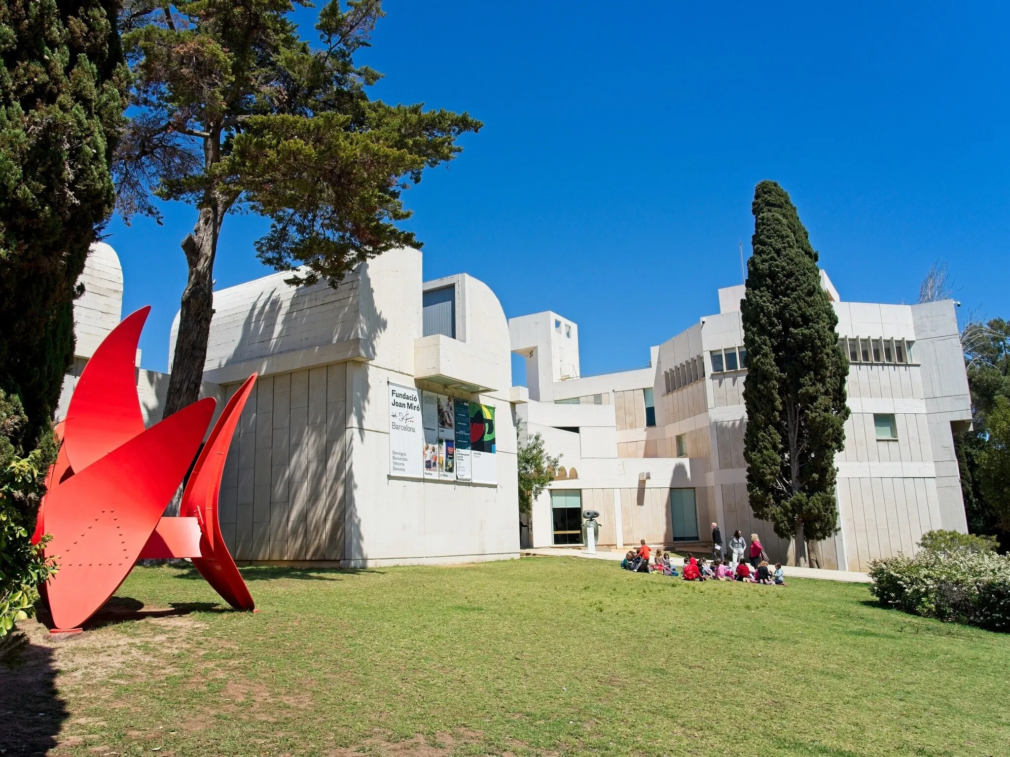 School class sitting in front of museum Fundació Joan Miró in Barcelona