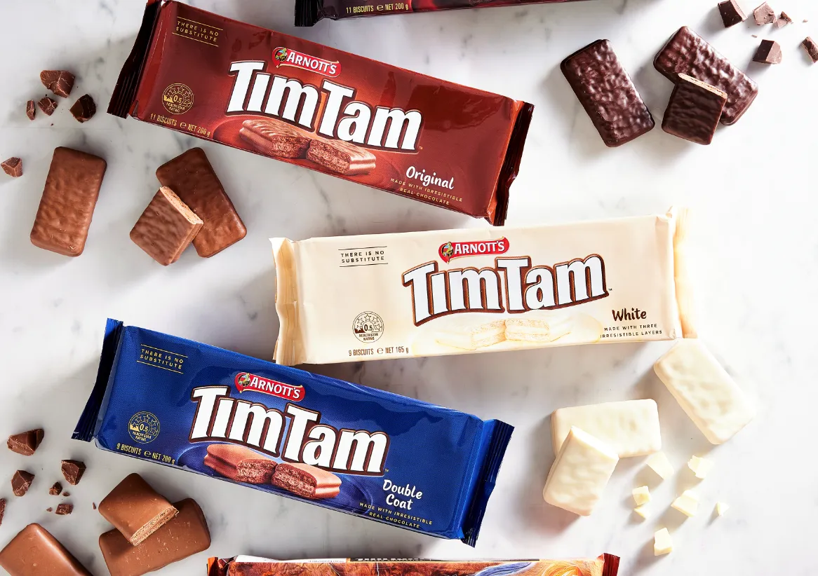 Three packets of Tim Tams