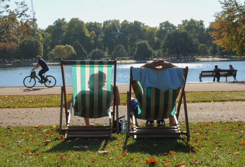 People on deckchairs in sunshine