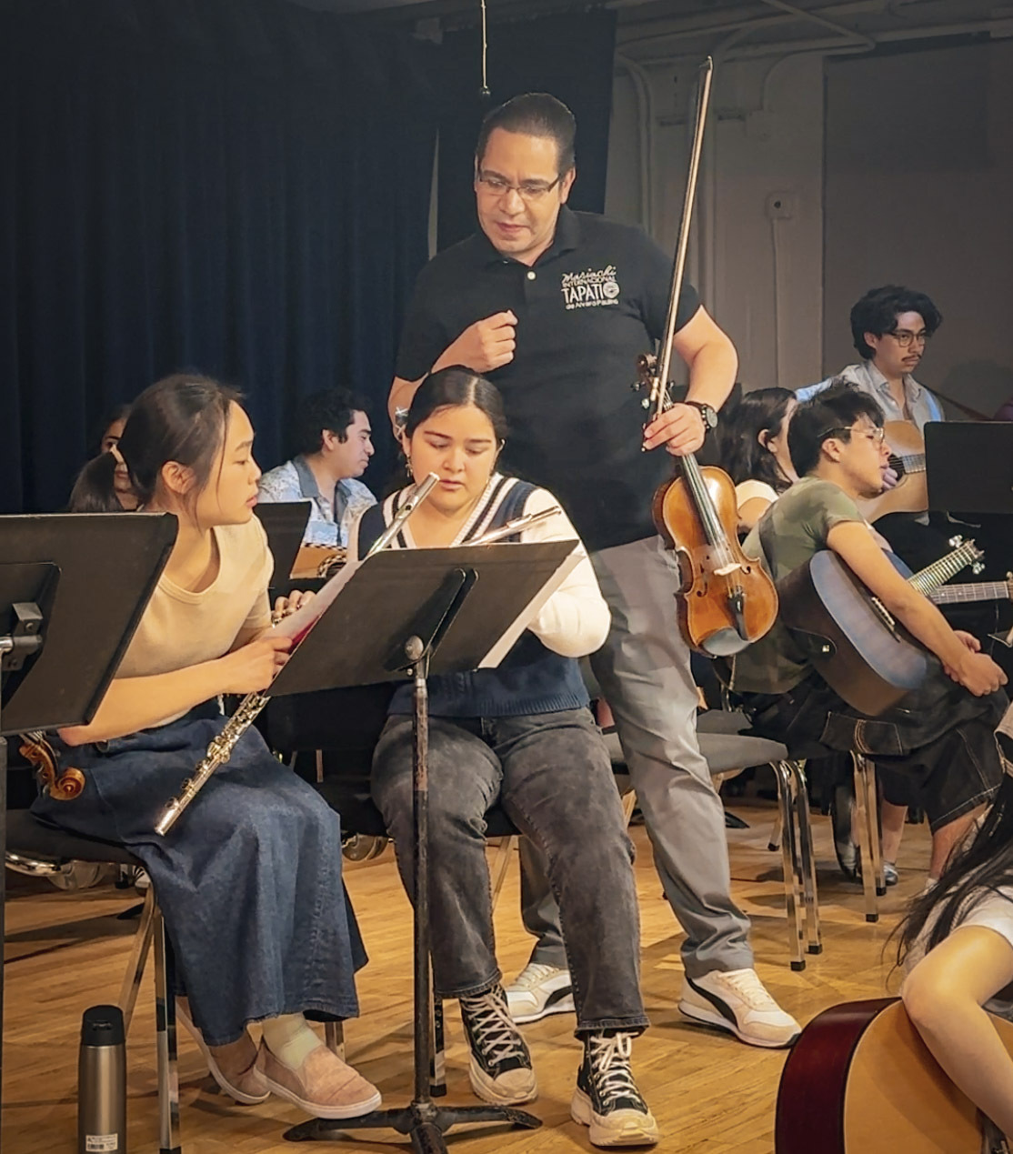 Alvaro teaching mariachi