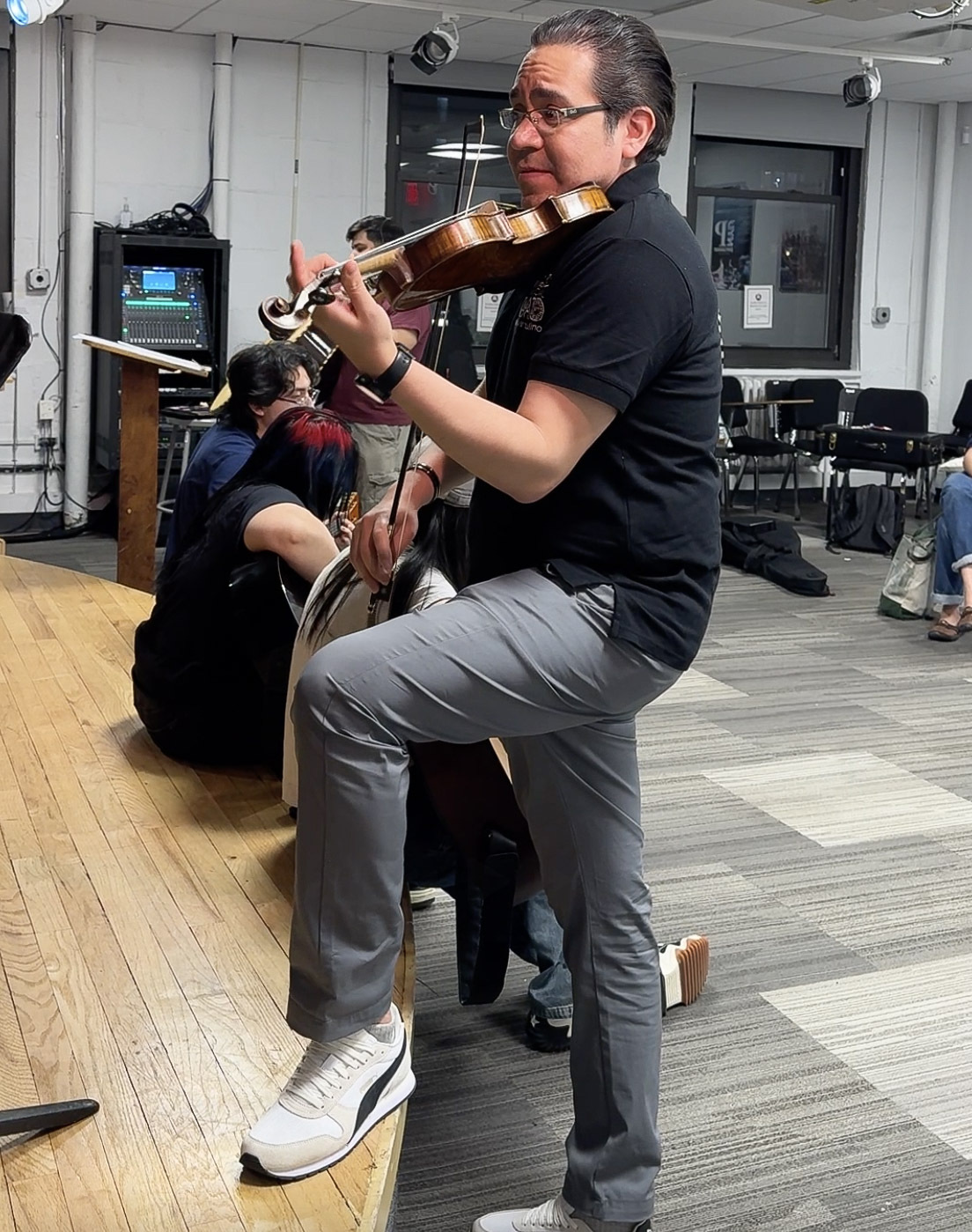 Alvaro teaching mariachi