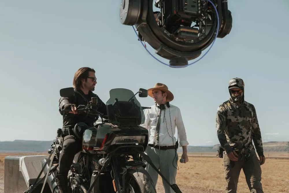Sebastian Stan on a Harley as Bucky with Jake Schreier (centre) directing him in Utah