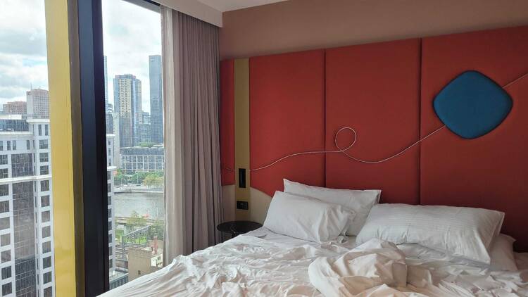 A hotel bed with a view