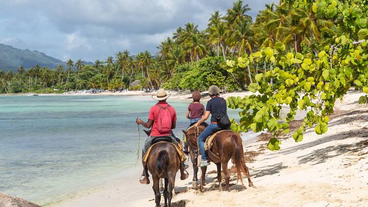 Go for a horseback ride by the sea
