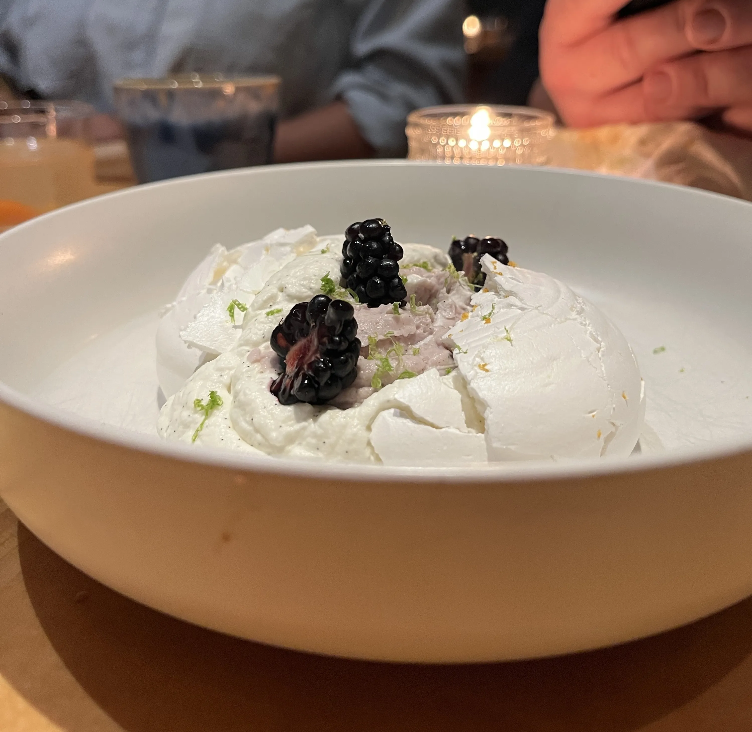 | A A Oaxacan corn pudding known as Nicuatole with a topping of meringue and zest