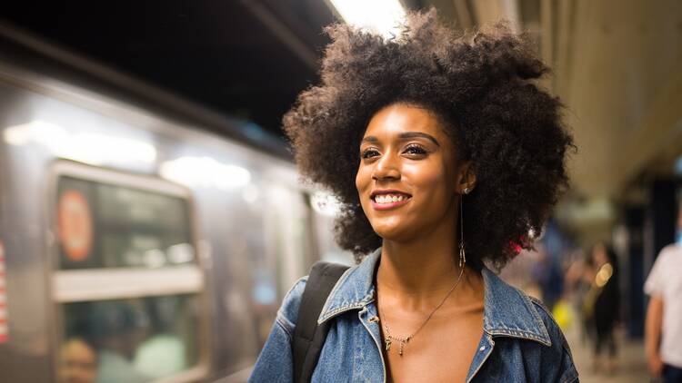 Happy New Yorker waiting for the subway