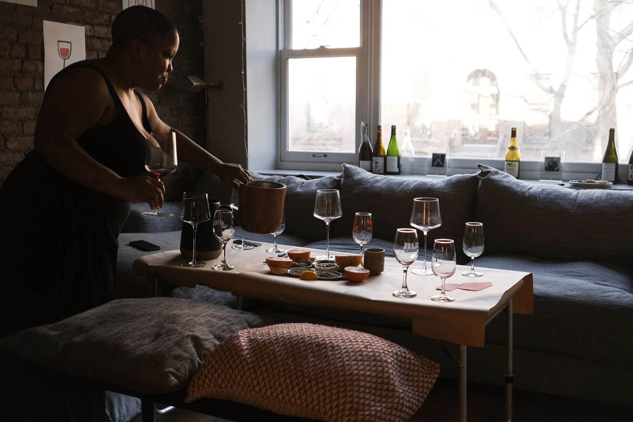 Amari from Vin Dealer setting a table