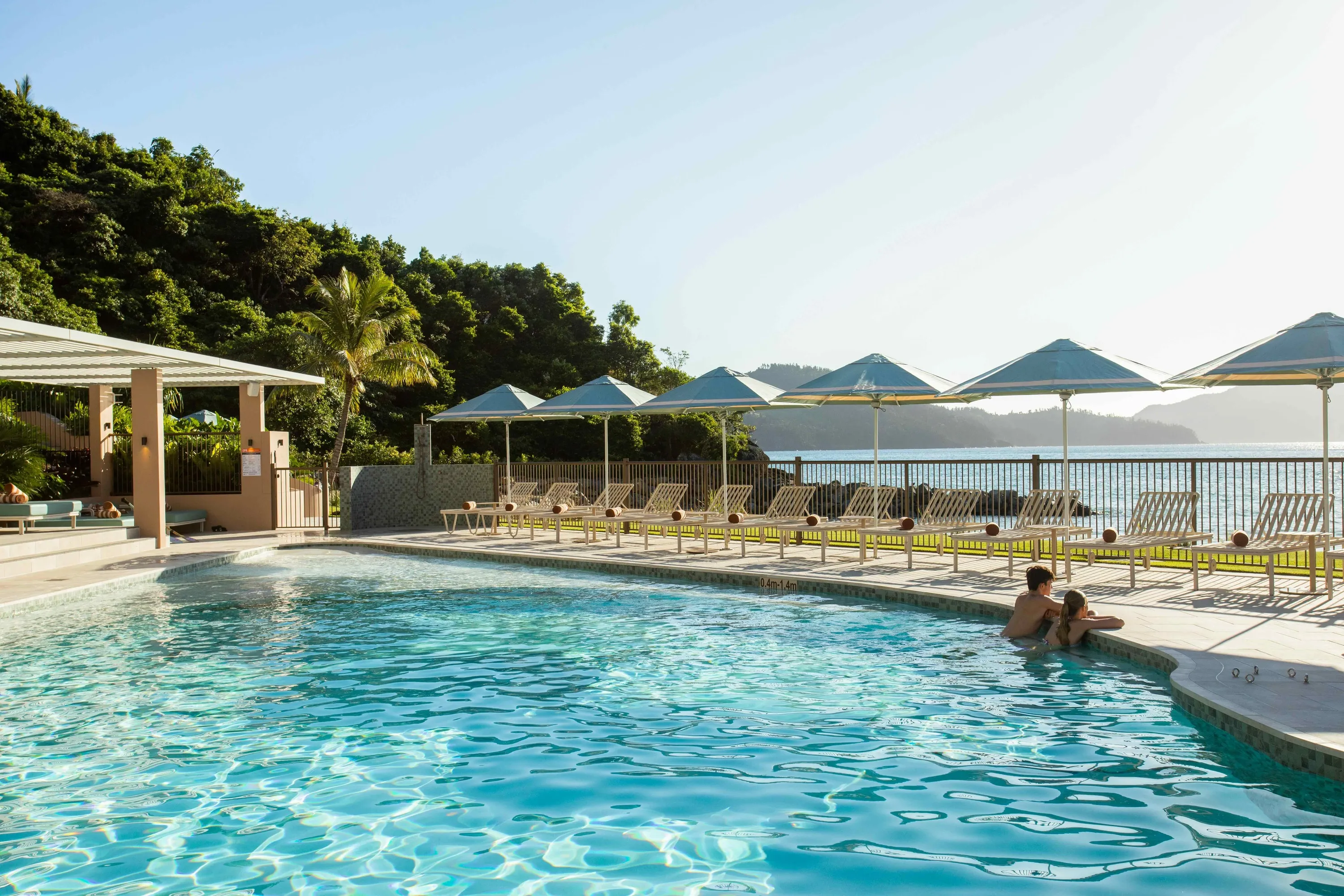Hotel pool with loungers