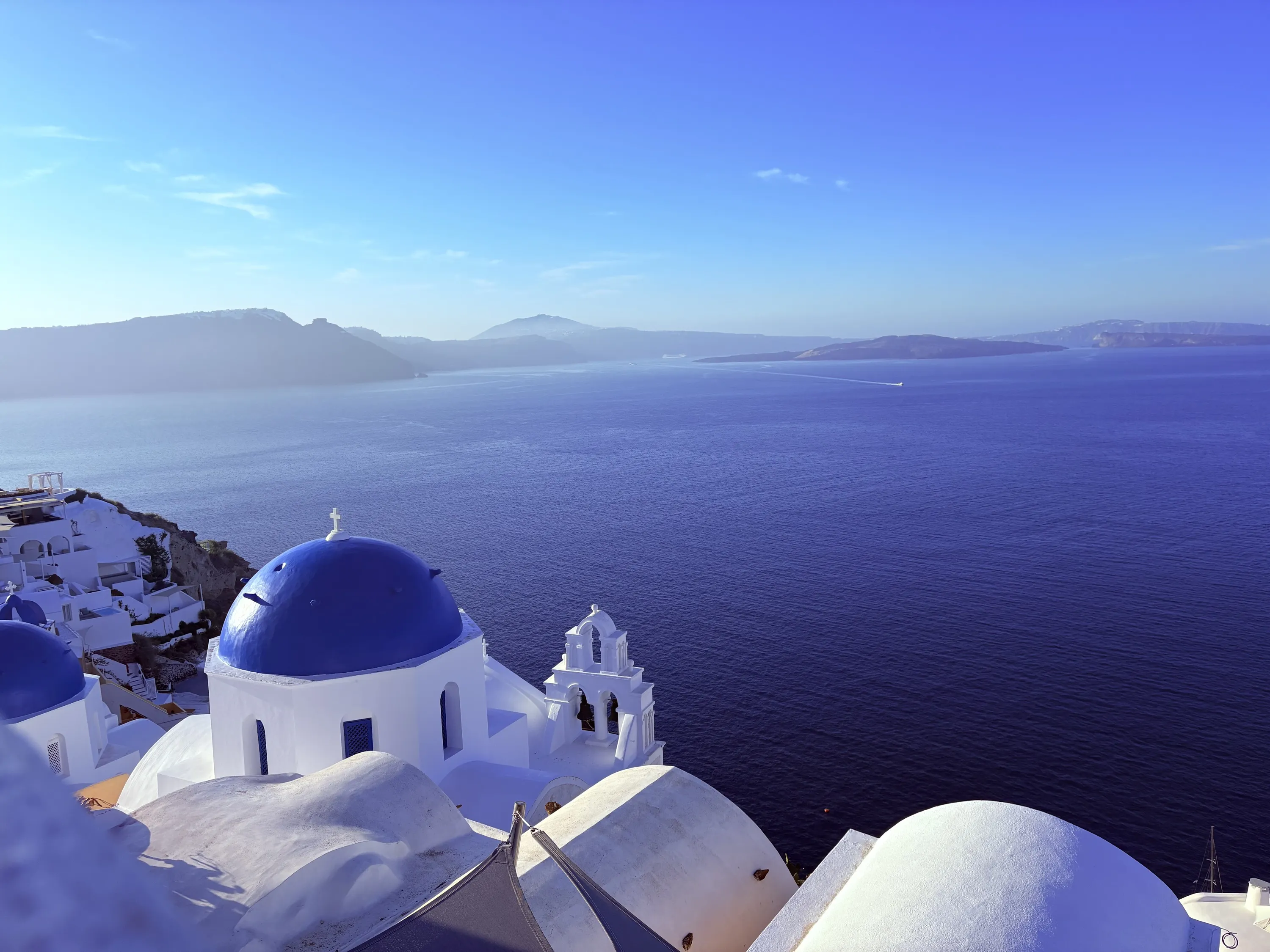 A blue domed church in Santorini