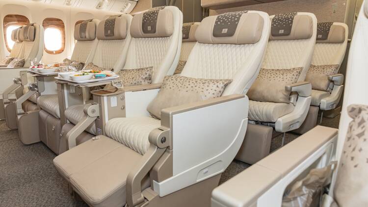 Emirates Premium Economy seats show the calf rest in use