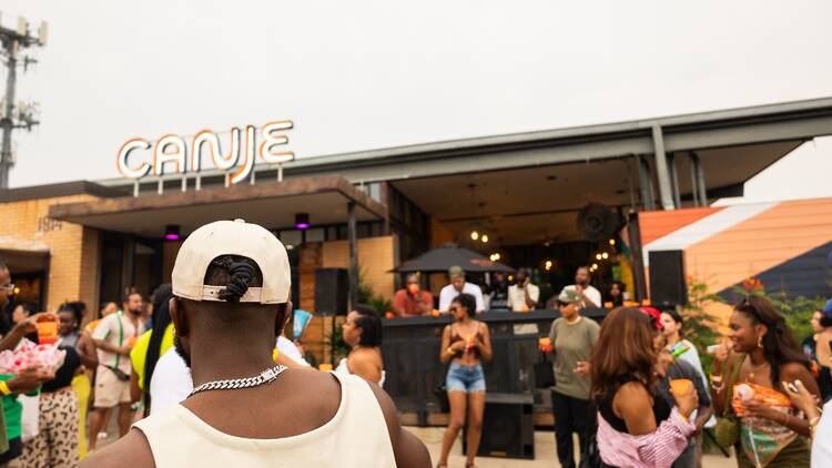 People mingling at Canje Block Party 