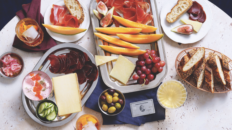 Flatlay of food with an American Express card