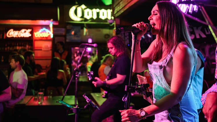 Singer performing at Mustang Bar