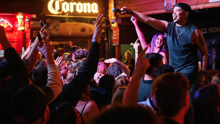 Singer performing at Mustang Bar