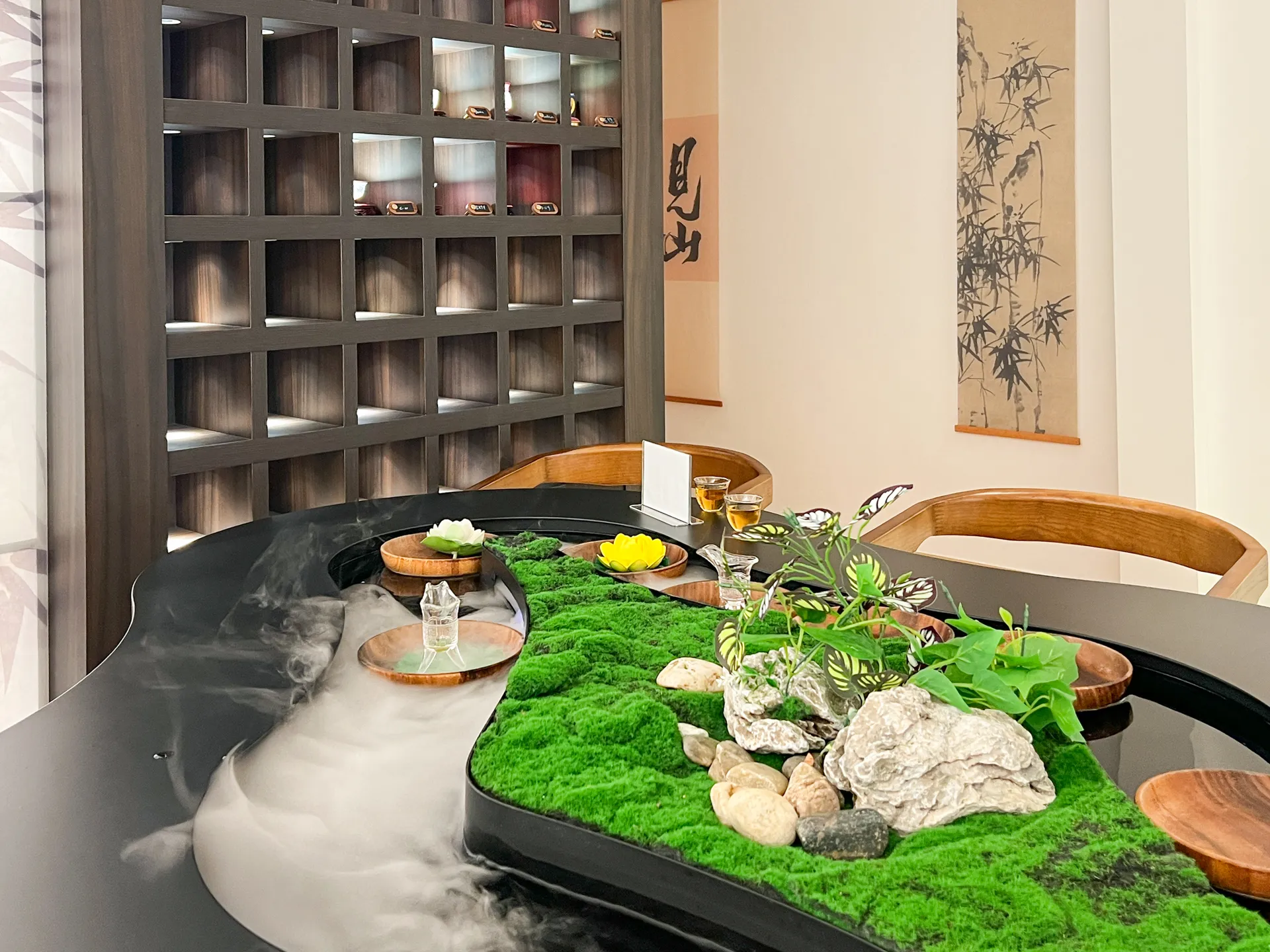 Incloud Singapore review - floating river teahouse with water table