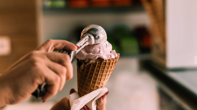 Scooping an ice cream cone