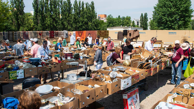 People shopping at the popular Flohmarkt am Mauerpark flea market in Berlin, Germany, which is set up every Sunday