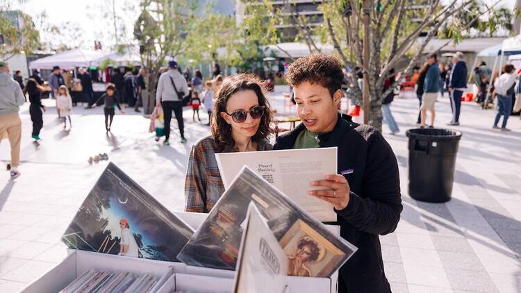 The Music Center's On the Record: Vinyl Fair Two people shopping for records at the Music Center.
