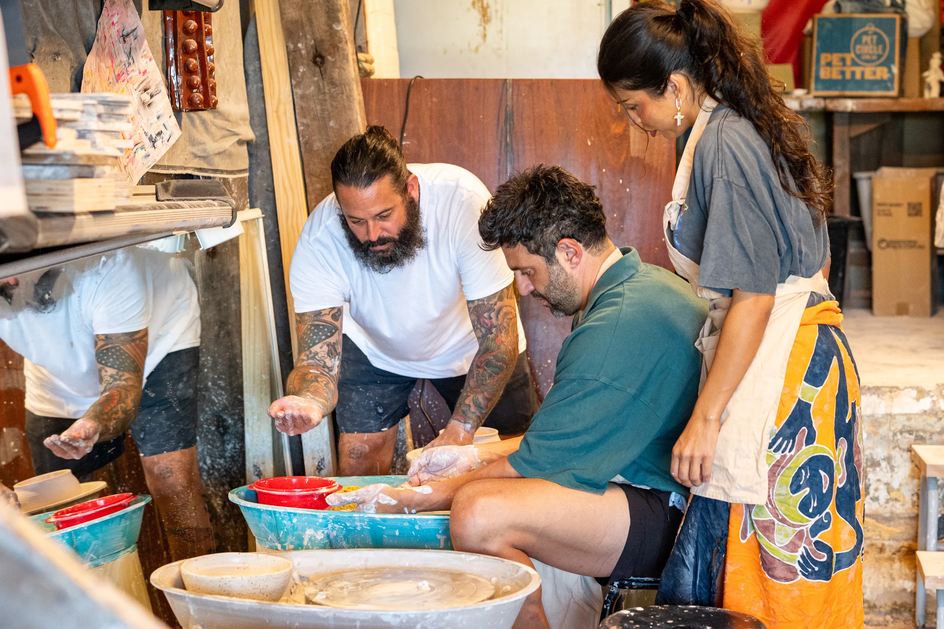 Couple doing pottery class