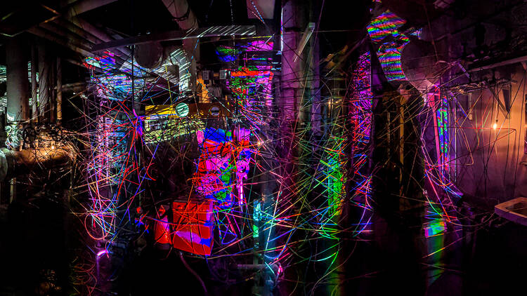 Kawai Masayuki, ‘Three Elements’, video projector, media player, cables, sound system, light bulbs, turntables 2024. Courtesy of MORI YU GALLERY
