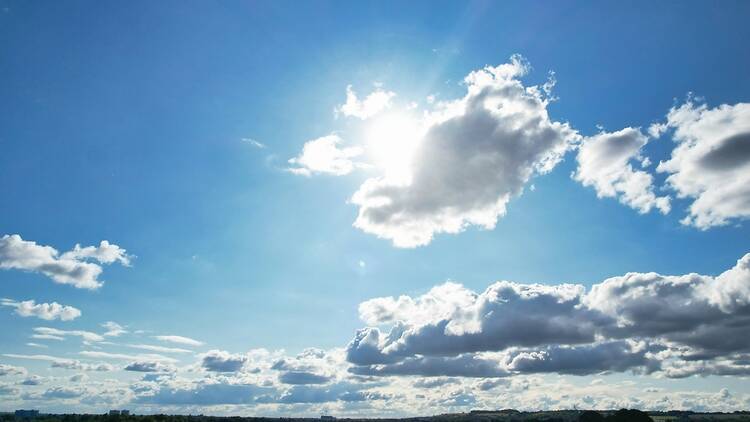 Sky in daytime with the sun and clouds