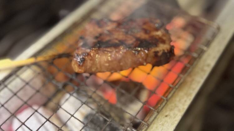 steak over a grill steak over a grill
