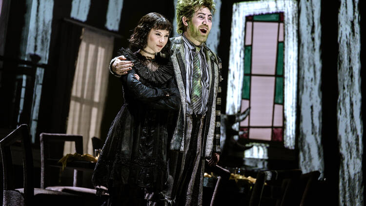 Karis Oka and Eddie Perfect in Beetlejuice the Musical.