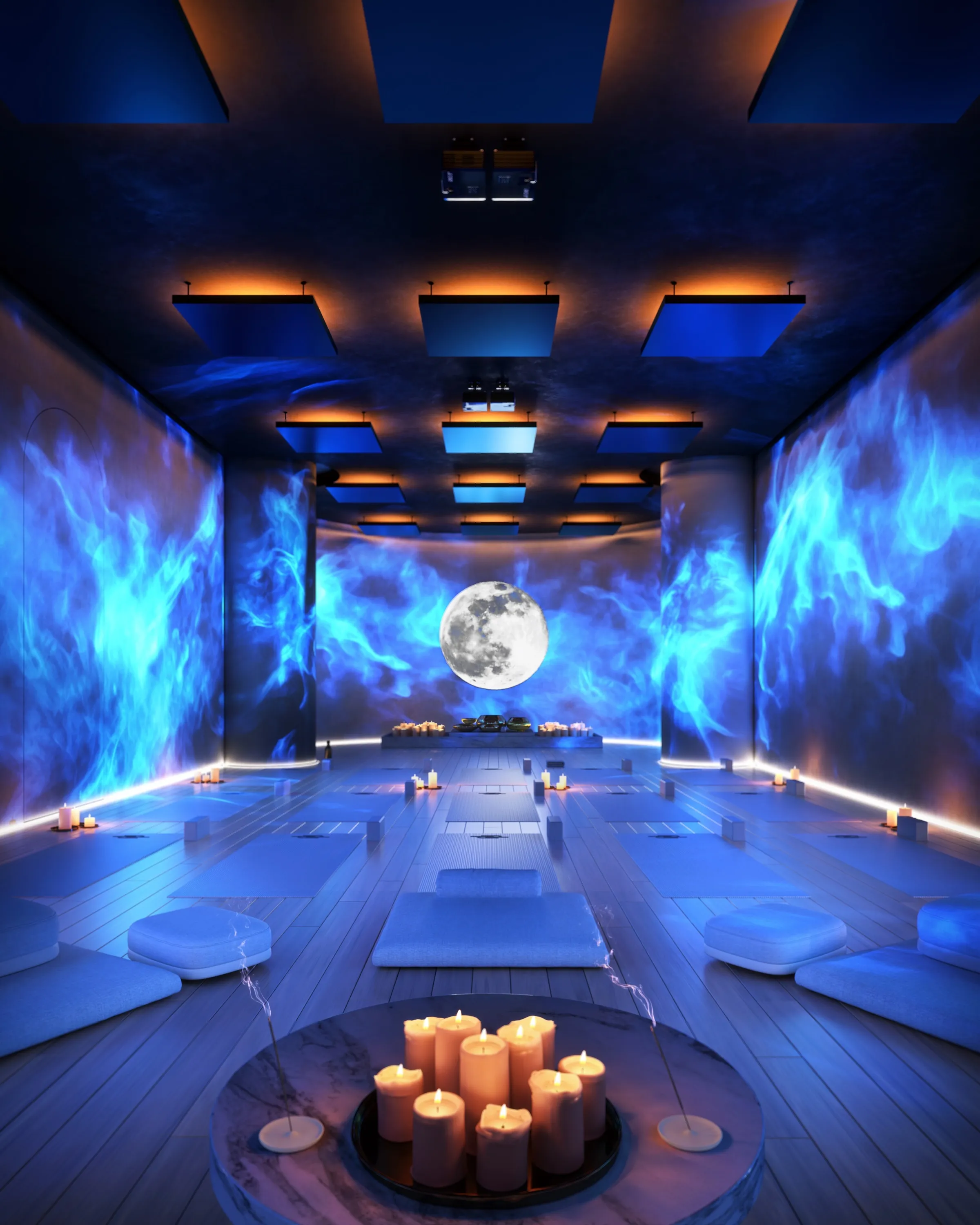 A yoga studio with projections on the walls and candles on the floors