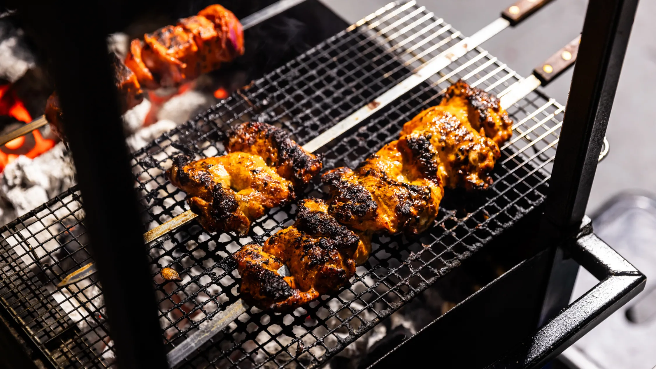 Meat cooking at Vivid Fire Kitchen