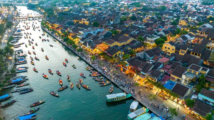 Aerial view of Hoi An ancient town at dusk or night, a UNESCO world heritage site
