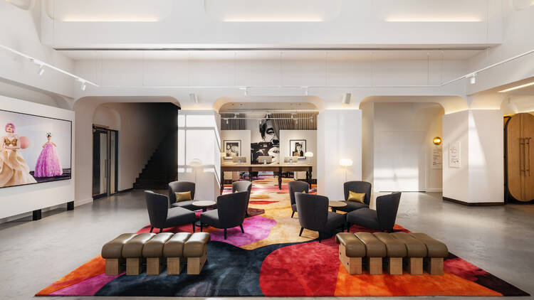 A hotel lobby with colourful furniture