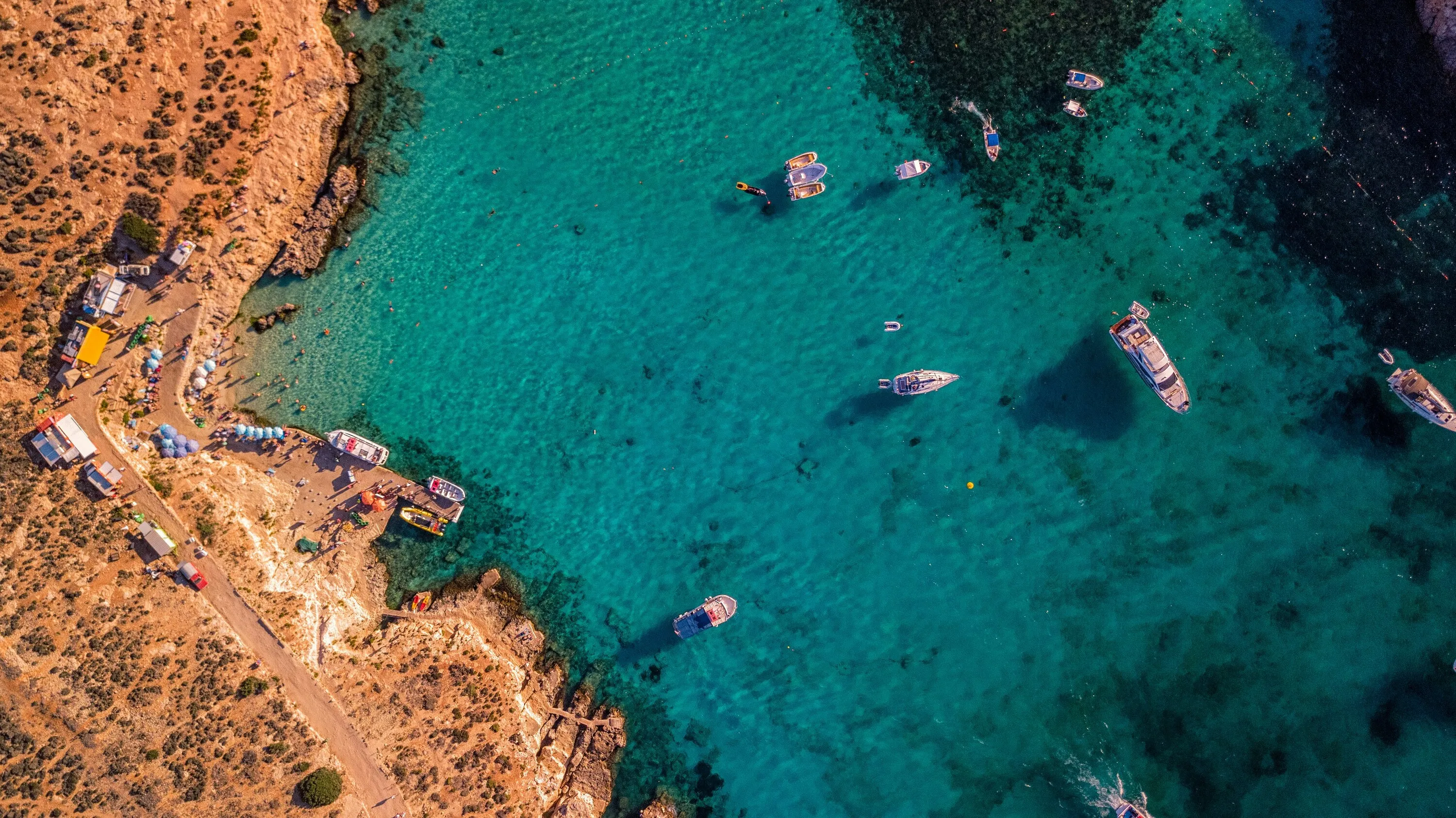 Aerial view of blue sea water near island