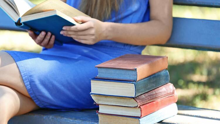 Woman reading on a bench