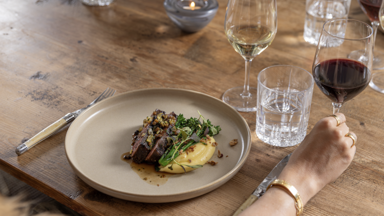 Dinner plate with glasses of wine