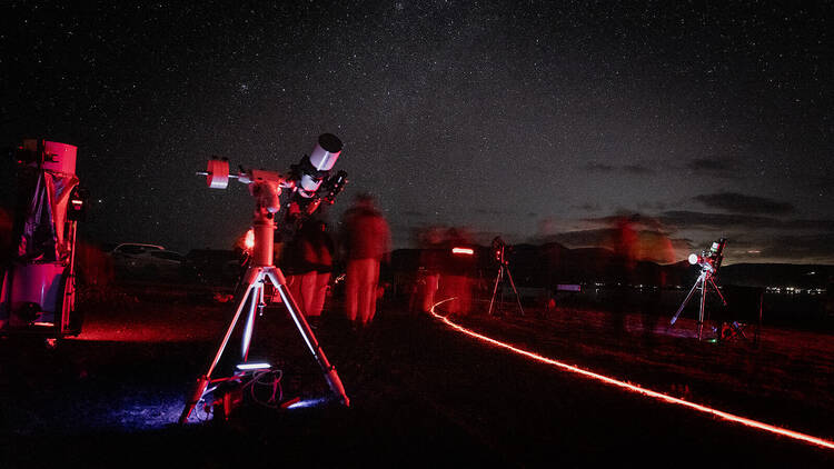 Telescopes pointing at the night sky