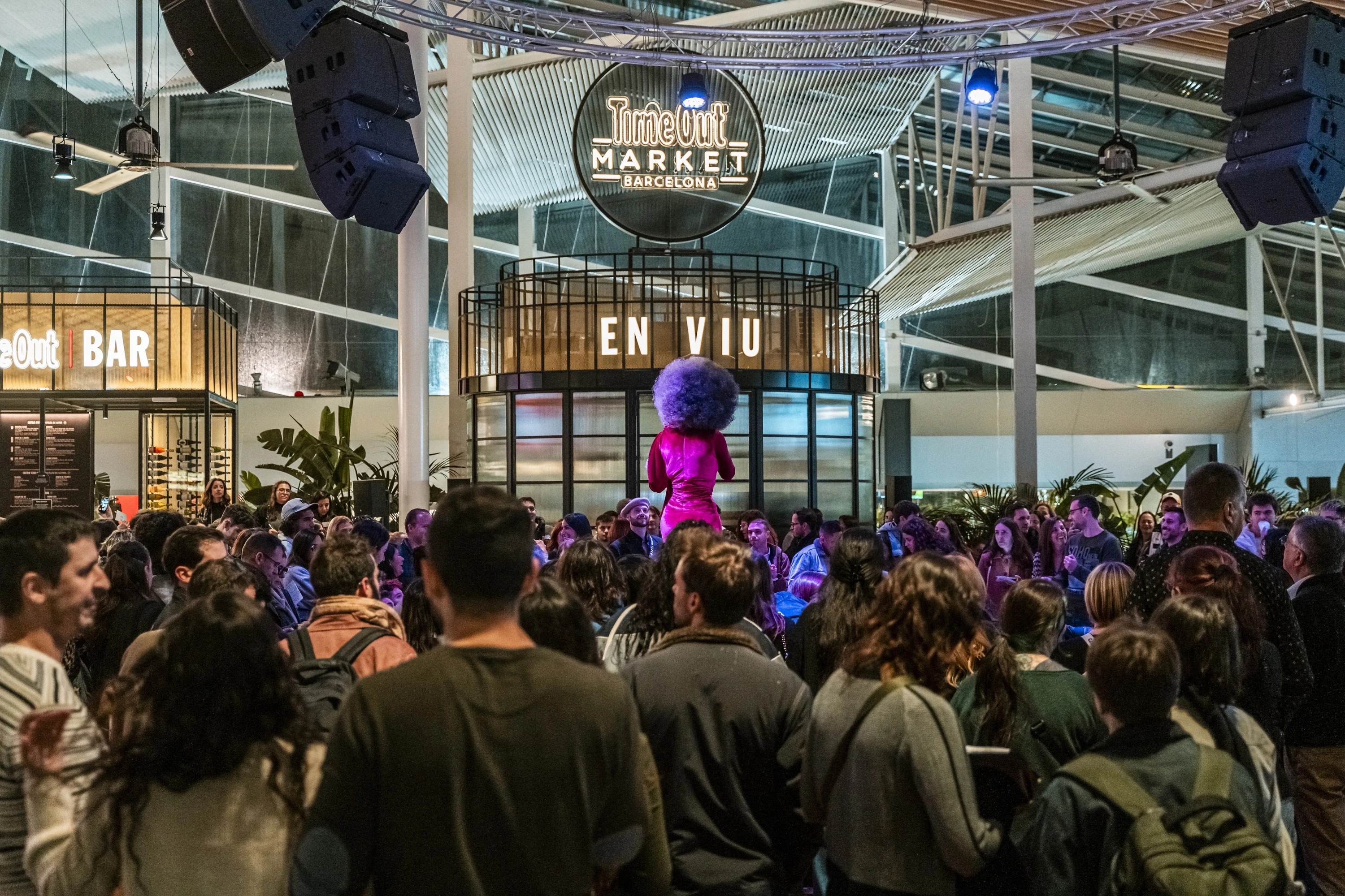 A drag queen on the central stage at Time Out Market Barcelona