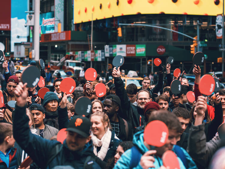 You can play ping pong in the middle of Times Square for free all summer