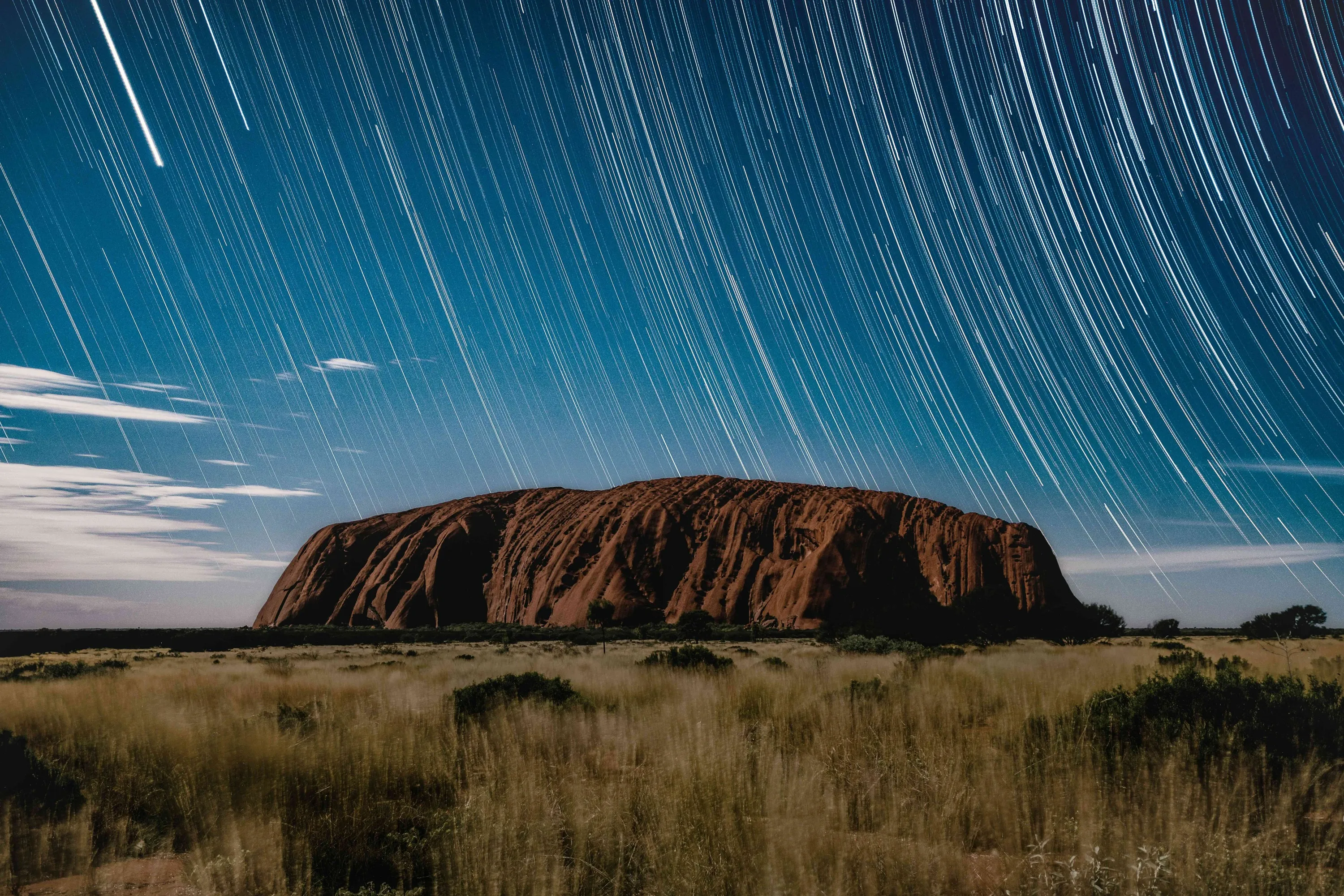 Time lapse photography of stars over Uluru
